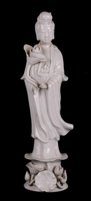 A Chinese Blanc de Chine figure depicting Guanyin, 30cms (12ins) high.Condition Report Reglued to