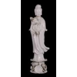A Chinese Blanc de Chine figure depicting Guanyin, 30cms (12ins) high.Condition Report Reglued to
