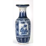 A large Chinese blue & white vase decorated with birds and foliage within panels, 63cms (24.75ins)