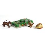 A group of four tinplate toys to include a dog and a kangaroo.