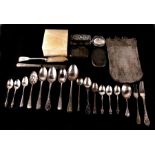 A quantity of silver items to include caddy spoons, a cigarette case, mesh purses and a silver