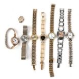 A quantity of ladies wrist watches.