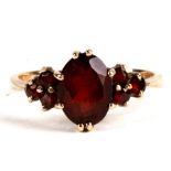 A 9ct gold garnet set ring approx UK size M