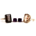 A 14ct gold dress ring set with a large rectangular smoky quartz; together with another similar,