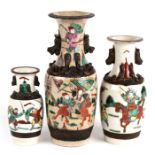 Three Chinese crackle glaze vases decorated with warriors, the largest 25cm (9.75ins) high.Condition