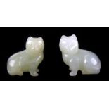 A pair of Chinese carved jade cats, 4cms (1.4ins) high.Condition ReportGood condition with no damage