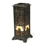 A Victorian pierced cast iron stove (converted to a lamp), 69cm (27ins) high.