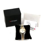 A Citizen automatic 21 jewel gentleman's wrist watch with day date aperture. Boxed, together with