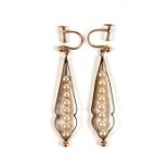 A pair of 9ct gold cage style earrings containing a line of eight faux pearls, 4.5cm (1.75 ins)