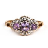 A 9ct gold amethyst and diamond ring, approx UK size 'J'.