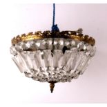 A brass mounted crystal bag chandelier, 30cms (12ins) diameter.