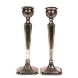 Military interest. A pair of silver candlesticks, Birmingham 1934, engraved 'Lieut FR Stovold,