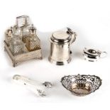 A silver plated lidded tankard, 12cms high; together with a silver plated cruet set and other