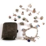 A silver charm bracelet; together with loose silver charms and a silver cigarette case, 115g.