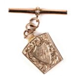 An early 20th century 9ct gold scroll and floral masonic keystone double locket on T bar. weighs 7.