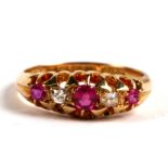 An early 20th century 18ct gold, ruby and diamond five stone ring, Birmingham 1911, 3.9g. Approx. UK