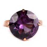 A 14ct gold ring set with a large amethyst, approx UK size 'M'.