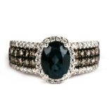 A 14ct white gold diamond and sapphire ring, approx UK size 'L'.Condition ReportNo stones missing,