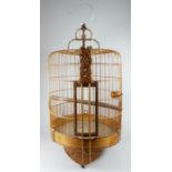 Two Chinese carved wooden birdcages. 50cm 19.75 ins) highCondition Reportgood overall condition