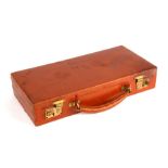 An Asprey's brown leather jewellery box with two internal cantilever trays. 33cm (13 ins) wide