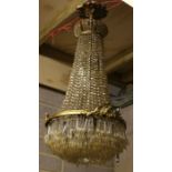 A gilt metal and crystal chandelier. 83cm 32.5ins high.