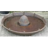 A cast iron Mexican Hat pig feeder / planter, 86cms (34ins) diameter.
