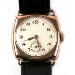 A 9ct gold cushion shape wristwatch.