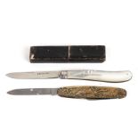 A Victorian silver and mother of pearl boxed fruit knife, Sheffield 1877; together with a brass