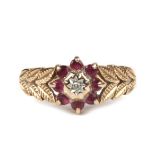 A 9ct gold ruby and diamond cluster ring, approx UK size 'O'.