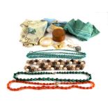 A quantity of costume jewellery to include a malachite bead necklace.
