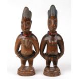 African/ Tribal Art. A pair of Nigerian Yoruba male and female Ibeji twin figures with strings of