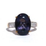 A 9ct gold blueberry quartz and diamond ring, approx UK size 'N'.
