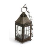 An Arts & Crafts copper hall lantern, 43cms (16.75ins) high.Condition Report Lacking two glass