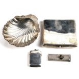 A silver cigarette case; together with a silver vesta; a silver cigar cutter and a silver shell
