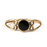 A 9ct gold black onyx set ring, approx UK size 'K'.