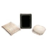 Two silver compacts & a silver photo frame (3).