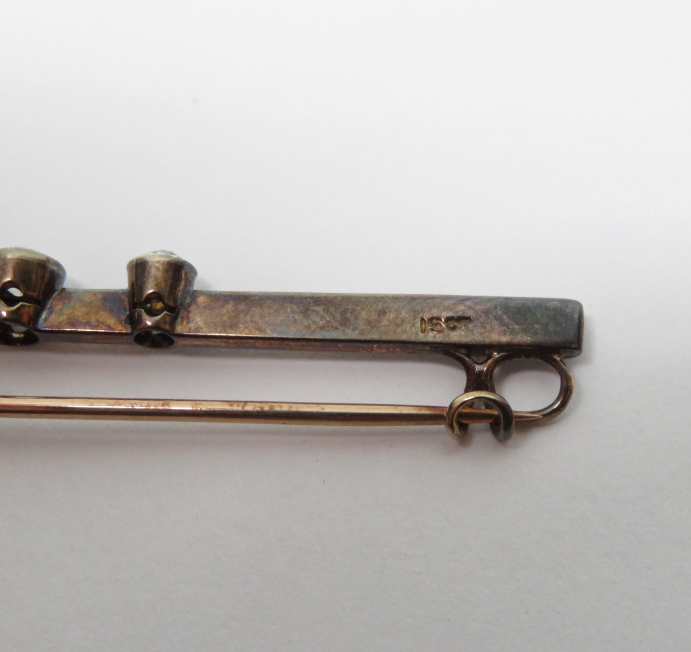 A three stone diamond bar brooch, stamped '15ct', the old cut stones totalling approximately 0.4 - Image 5 of 5