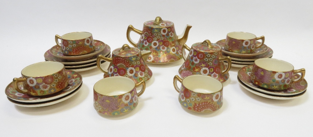 A Japanese Koshida six piece tea service comprising six side plates, six saucers, six tea cup,