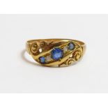 An Edwardian sapphire and diamond 18 carat gold ring, Birmingham 1907, the three graduated round