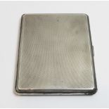 An engine turned silver cigarette case, Birmingham 1931, Cohen & Cohen, 134.7 grams gross