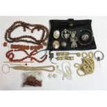 A silver hallmarked sovereign case, together with a paste set French clip, a jet locket, an agate