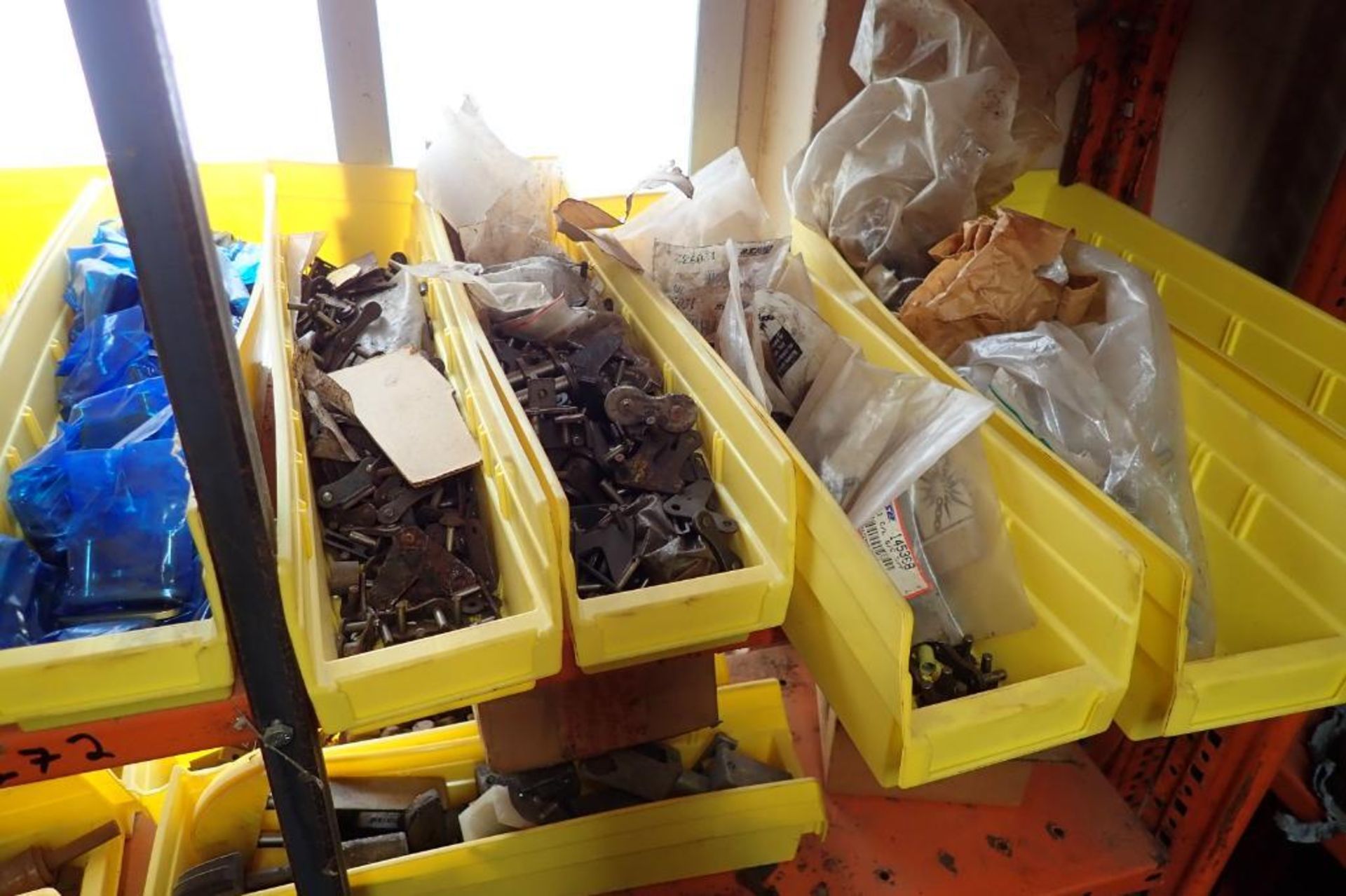 Contents only of 4 sections of shelving of assorted parts, gears, lug chain. **Rigging Fee: $150** - Image 7 of 21