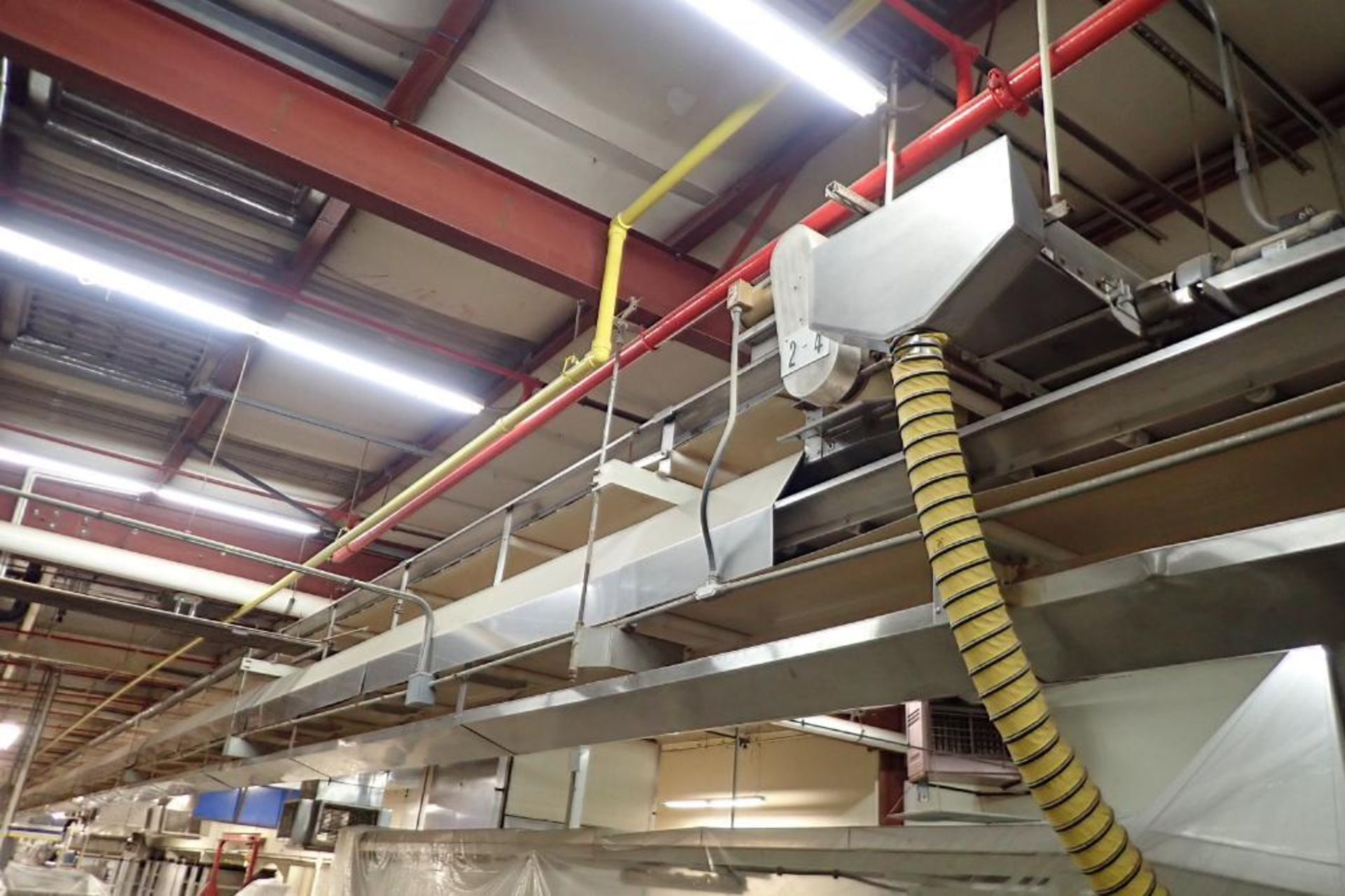 SS belt conveyor, 135 ft. long x 18 in. wide, suspended from ceiling. **Rigging Fee: $1250** - Image 2 of 5