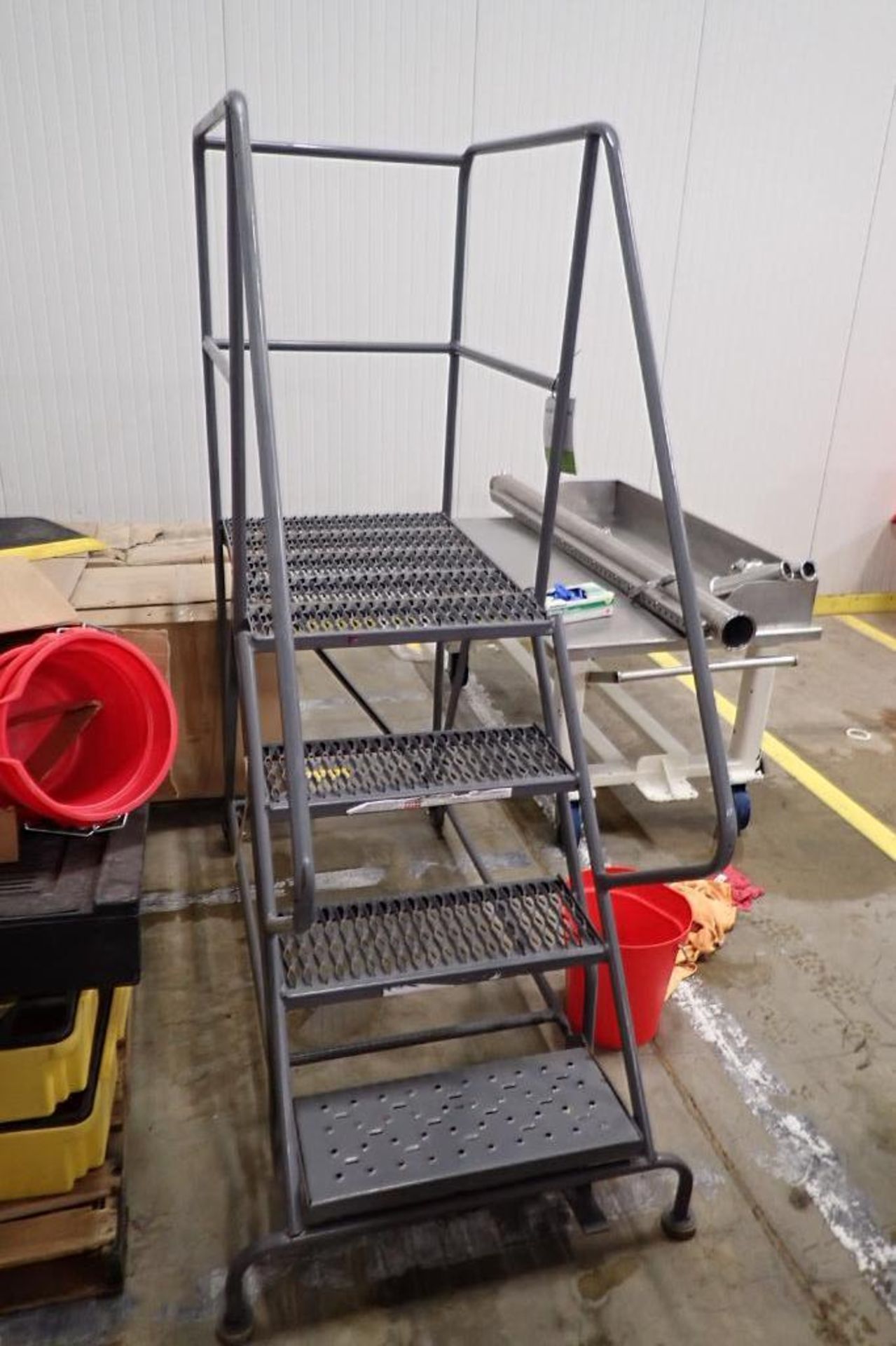 4-step Tri-Arc rolling warehouse ladder. **Rigging Fee: $50** - Image 2 of 4