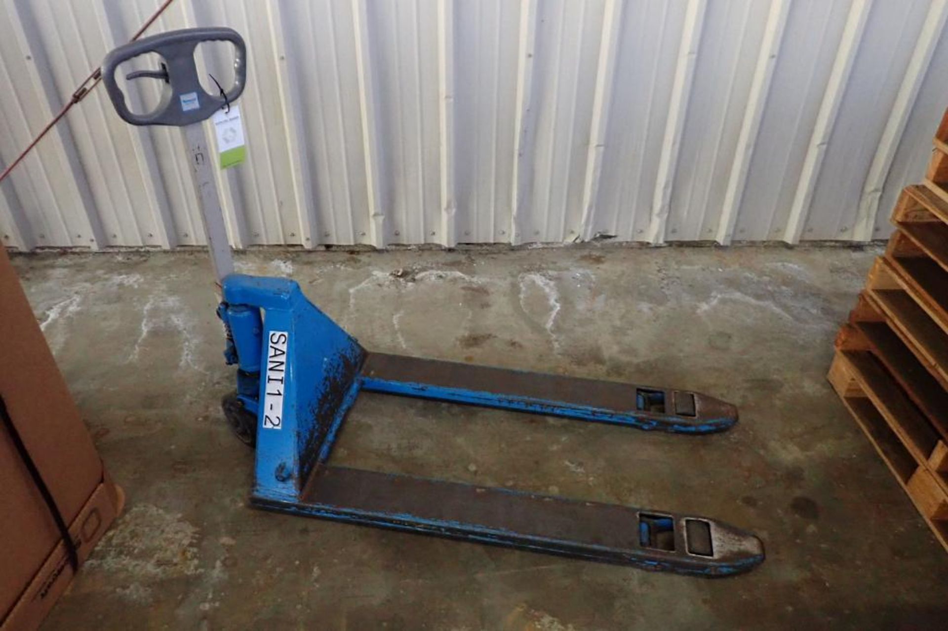 Bishamon hydraulic pallet jack, Model BS55, SN 11120520, 5500 lbs. capacity, blue. **Rigging Fee: $1