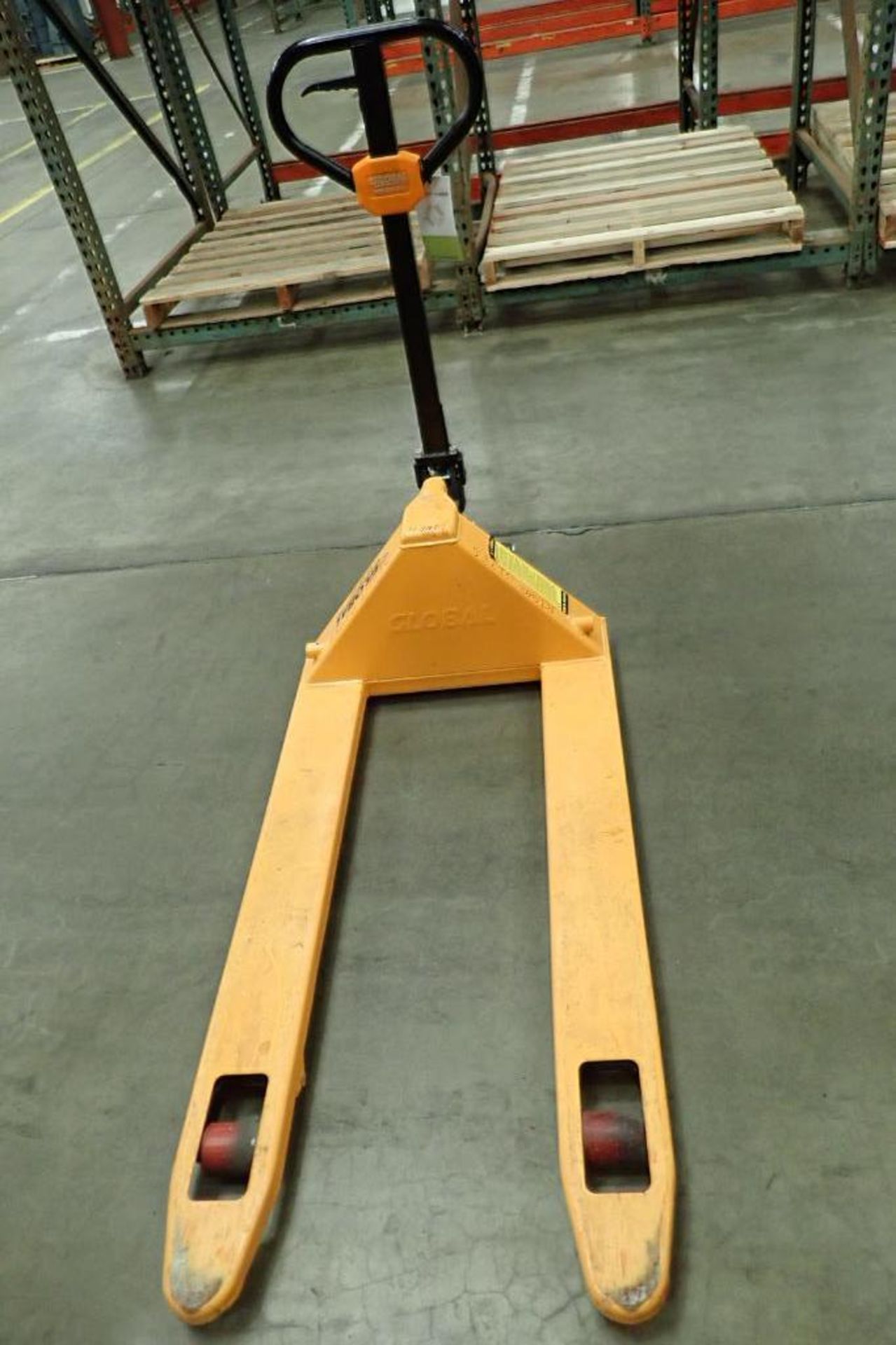 Global Industrial 5500 lb hand pallet jack, SN F695067, yellow. **Rigging Fee: $10** - Image 3 of 6
