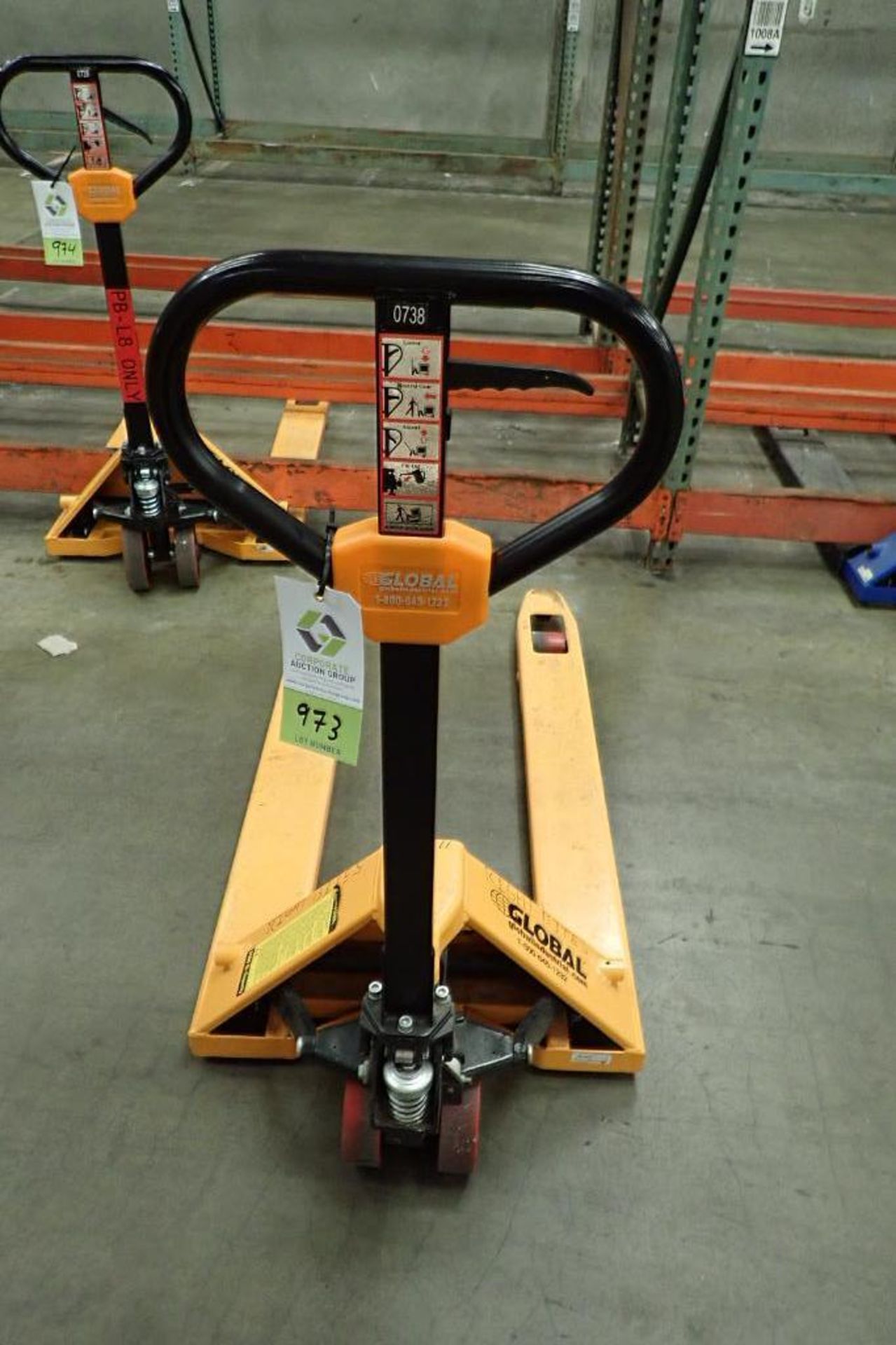 Global Industrial 5500 lb hand pallet jack, SN F695067, yellow. **Rigging Fee: $10** - Image 4 of 6
