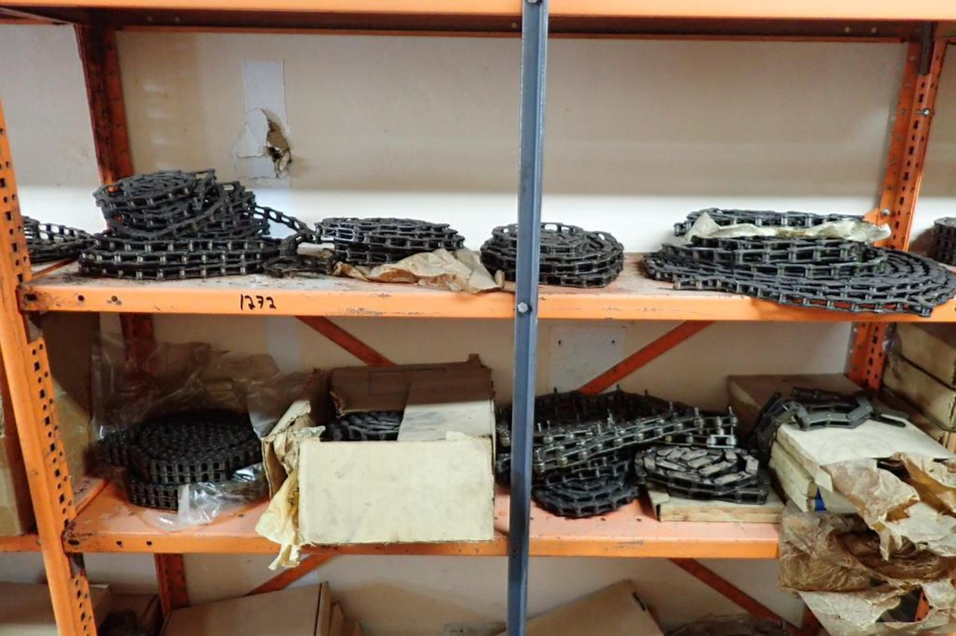 Contents only of 4 sections of shelving of assorted parts, gears, lug chain. **Rigging Fee: $150** - Image 18 of 21