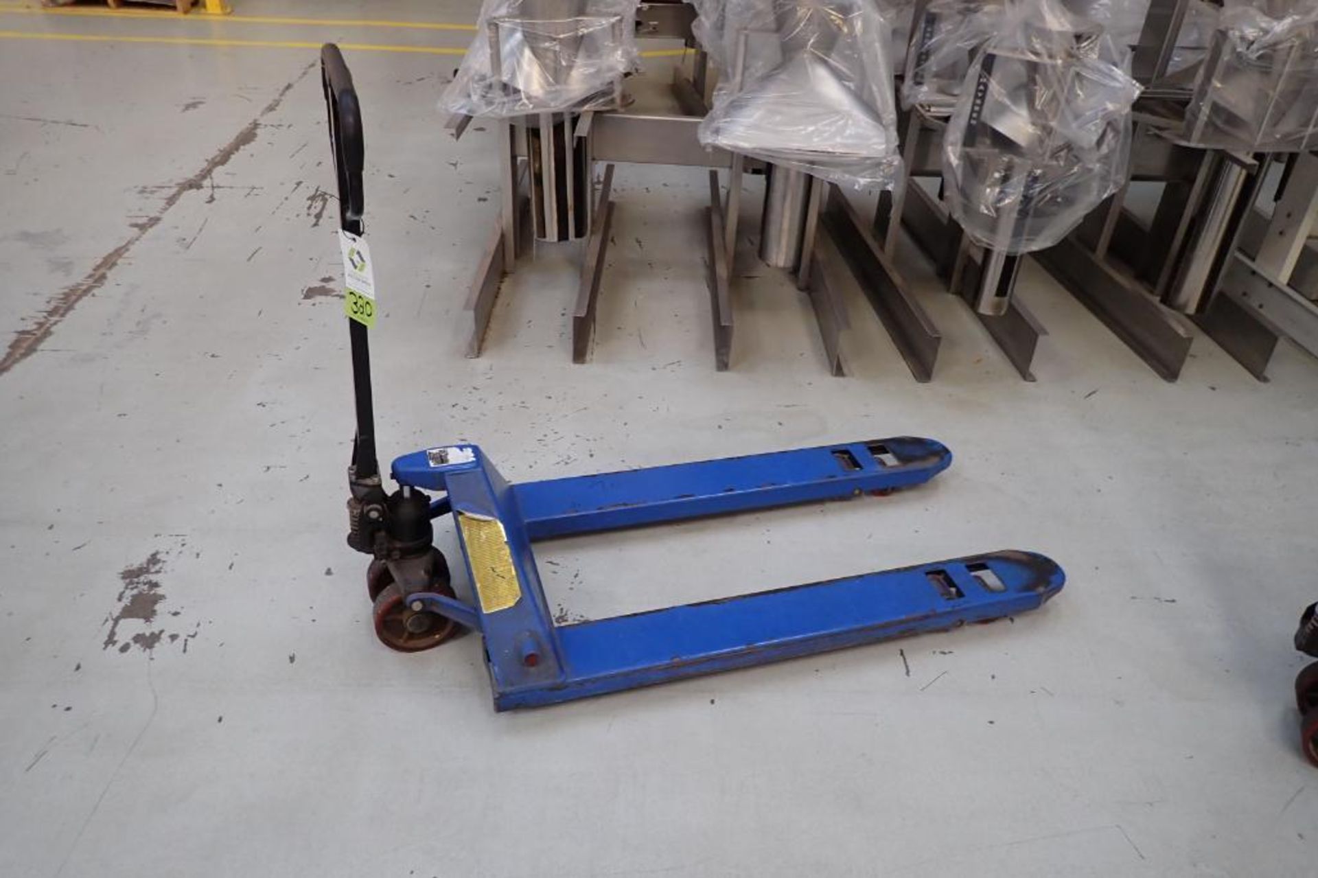 Global Industrial pallet jack, 5000 lb. capacity, blue. **Rigging Fee: $10**