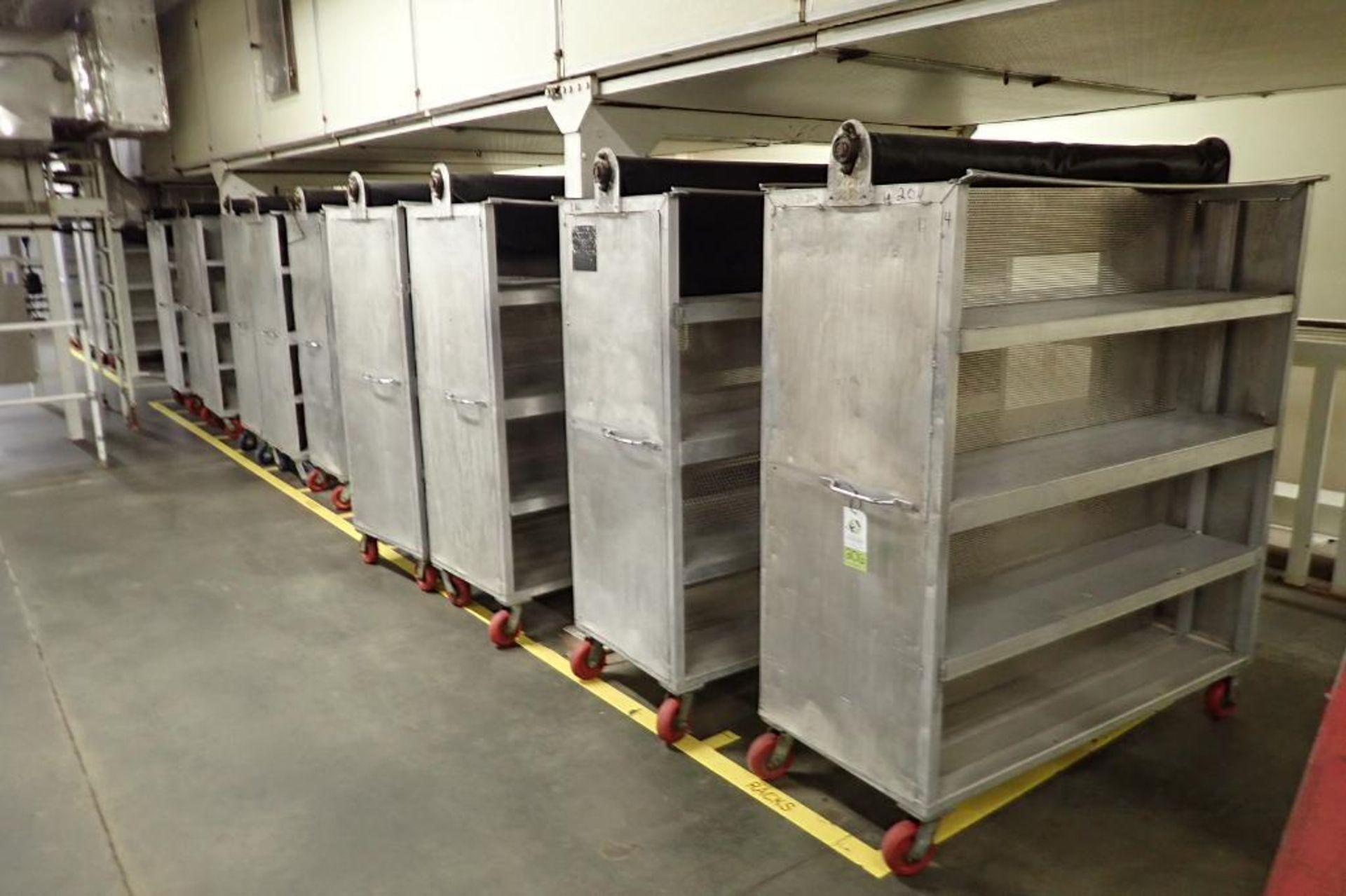 Aluminum bread carts, 63 in. long x 27 in. deep x 70 in. tall, 4 shelves, on casters. **Rigging Fee: